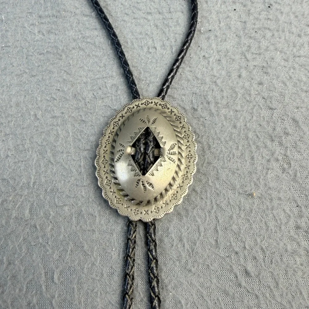 Vintage Western Bolo Tie Silver Tone Stamped Concho Black Braided Cord Cowboy